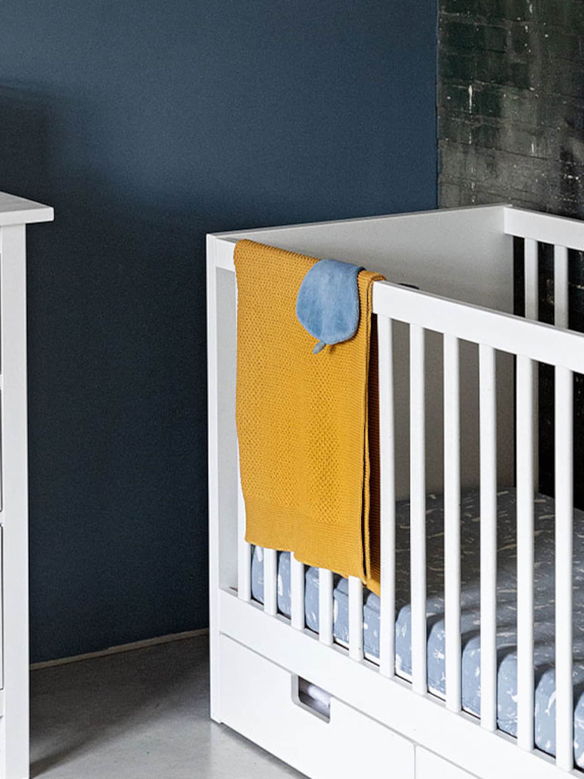 dit ledikant past bij de woonstijl van de babykamer