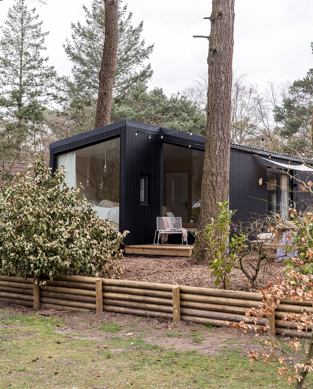 Houten huis ontworpen door Nikkie en Marc, gebouwd door Hertog Recreatiebouw.