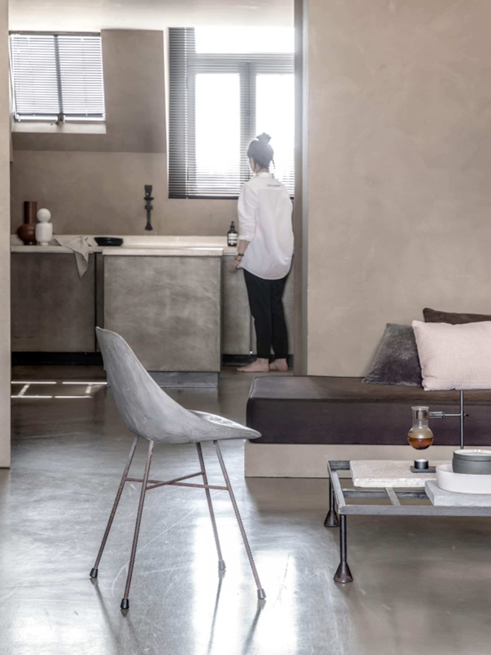 beton ruig dit interieur laat zien dat het ook een zachte kant heeft