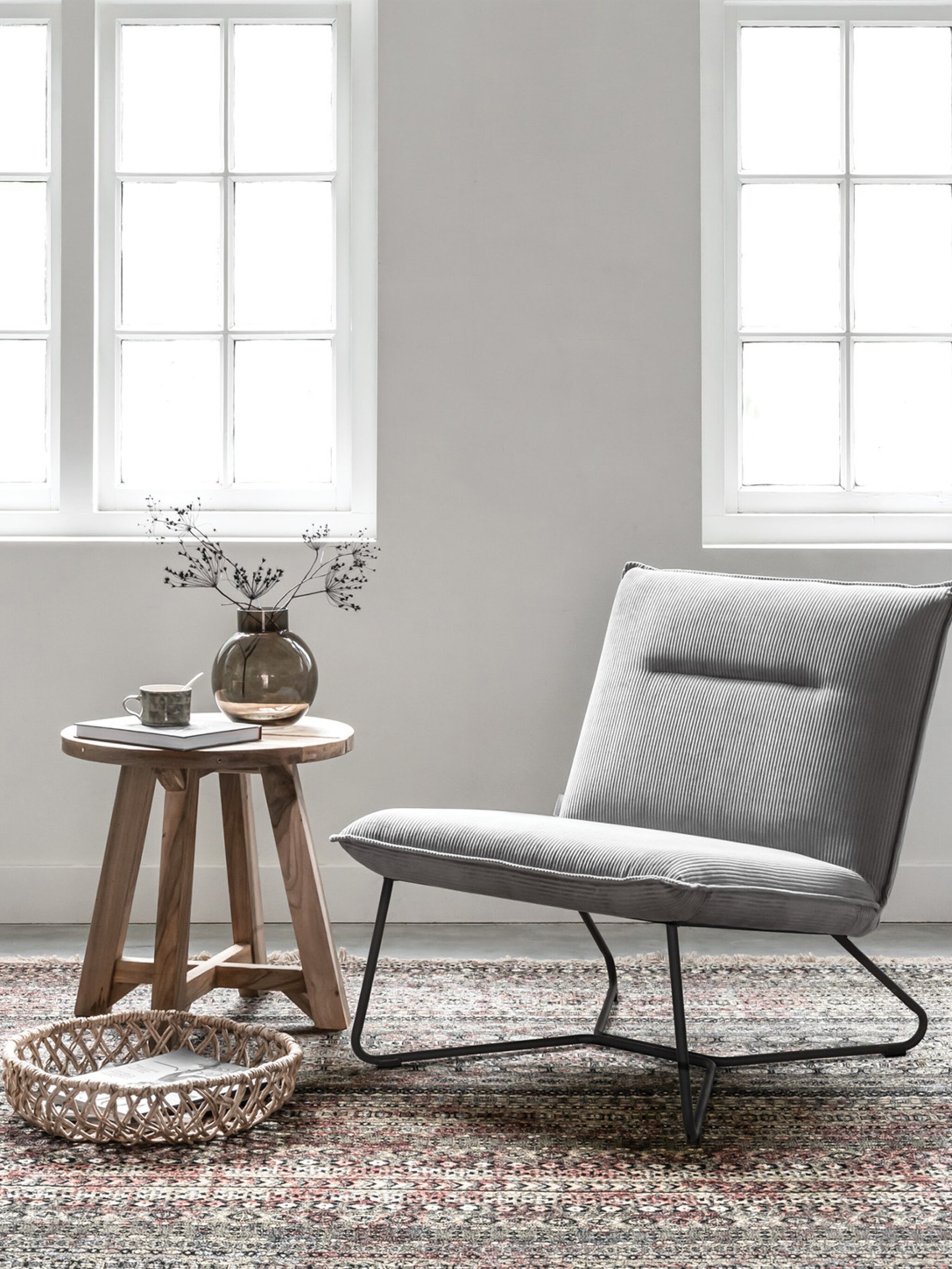 win een grijze lotus fauteuil van de troubadour