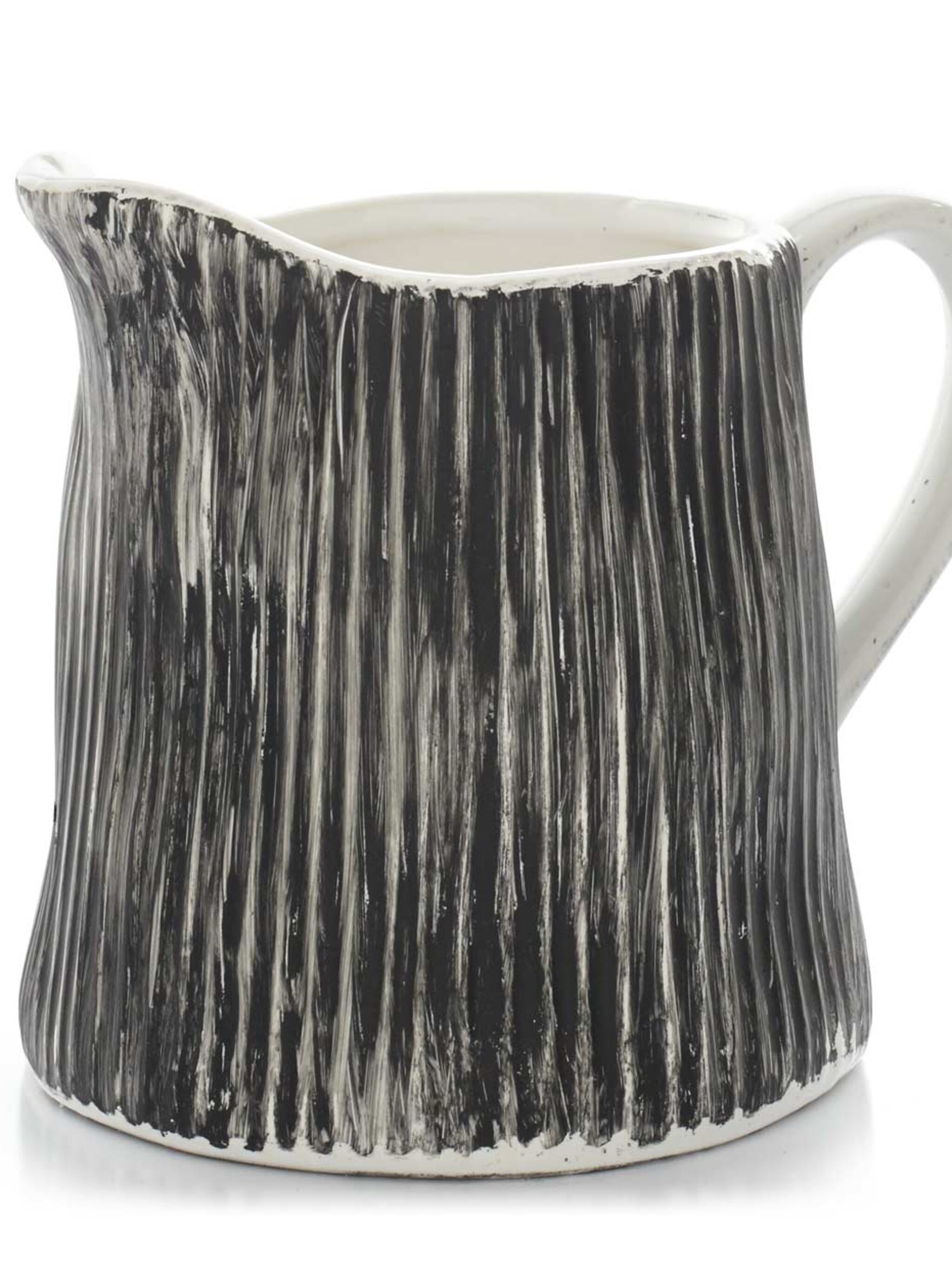 zo gemaakt dit melkkannetje met dubbelfunctie