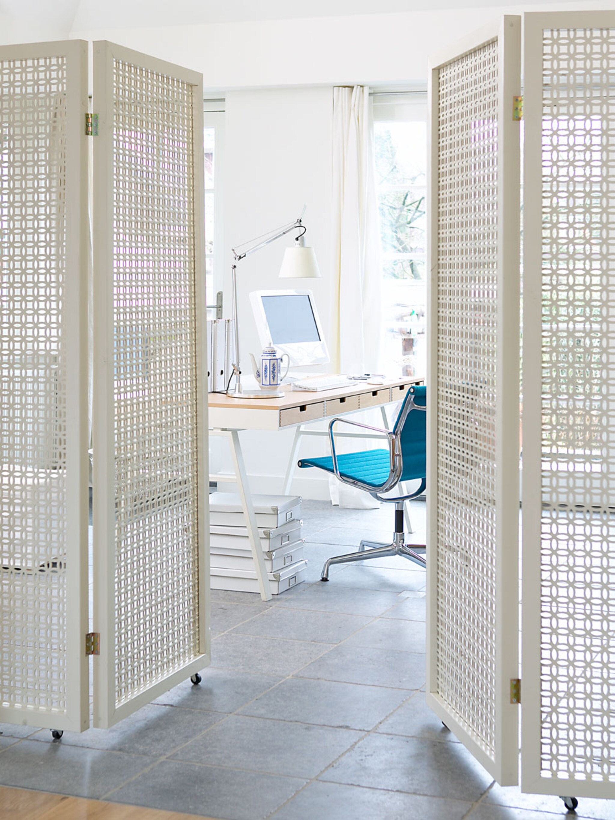 het kamerscherm als roomdivider