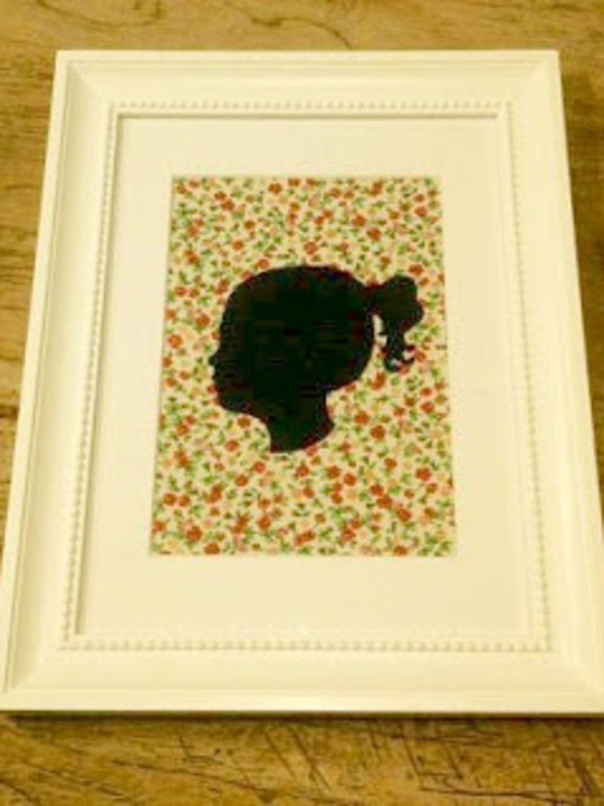 silhouet schilderij aan de muur
