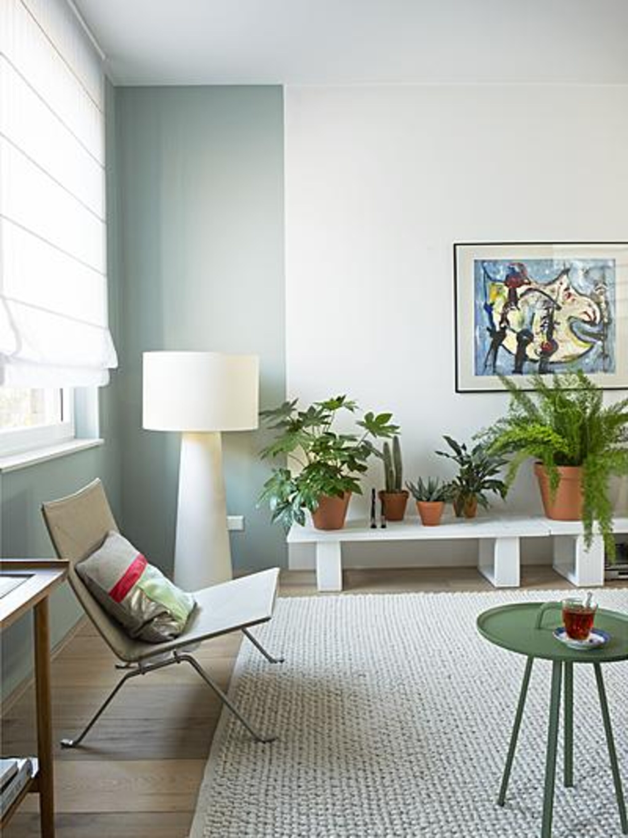 groen in huis met planten en grijsgroene muur