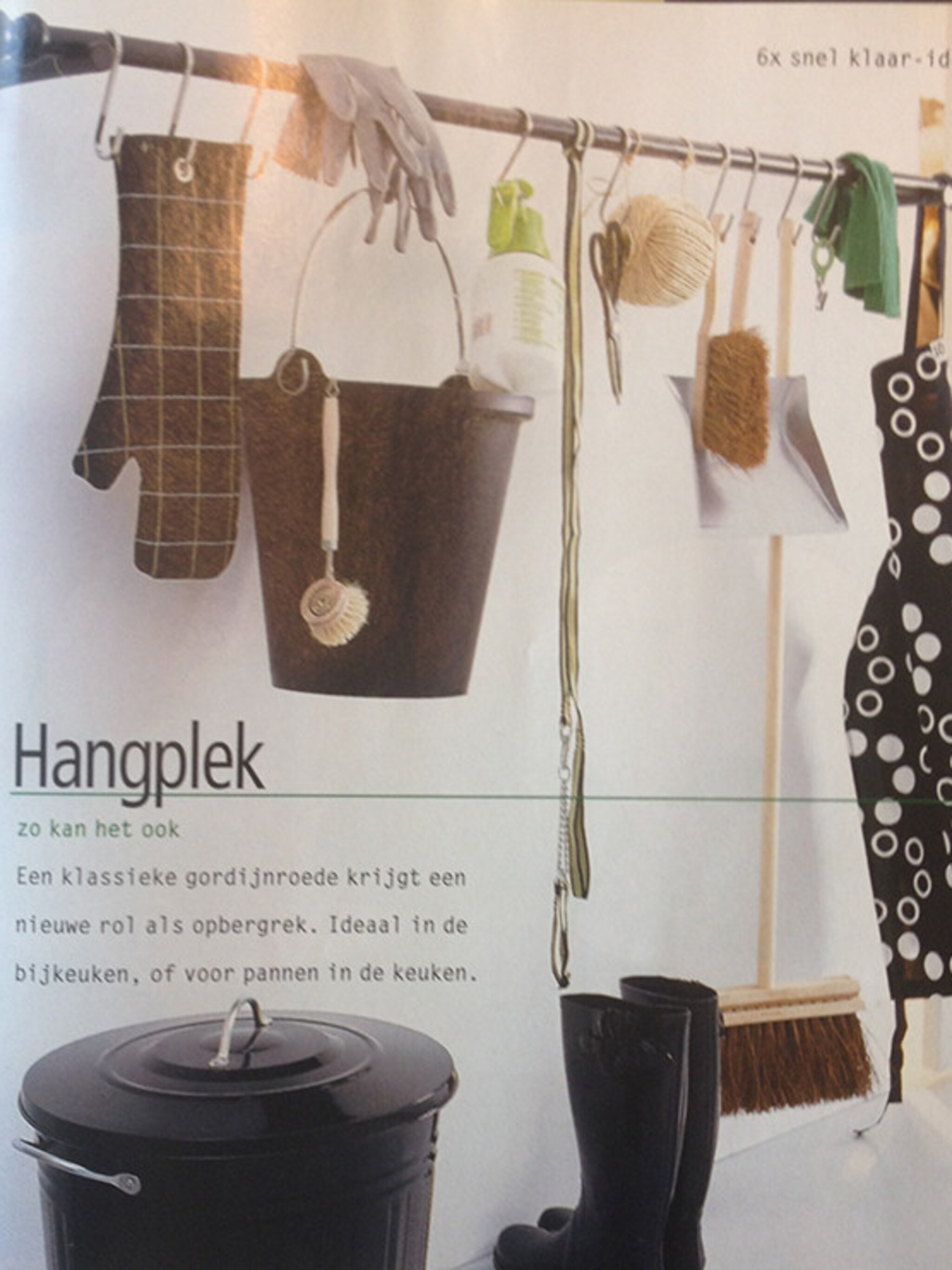 gordijnroede kapstok voor schoonmaakspullen