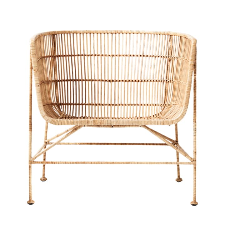House Doctor - Coon natural rotan loungestoel | Beeld via Living and Company House Doctor - Coon natural rotan loungestoel | Beeld via Living and Company