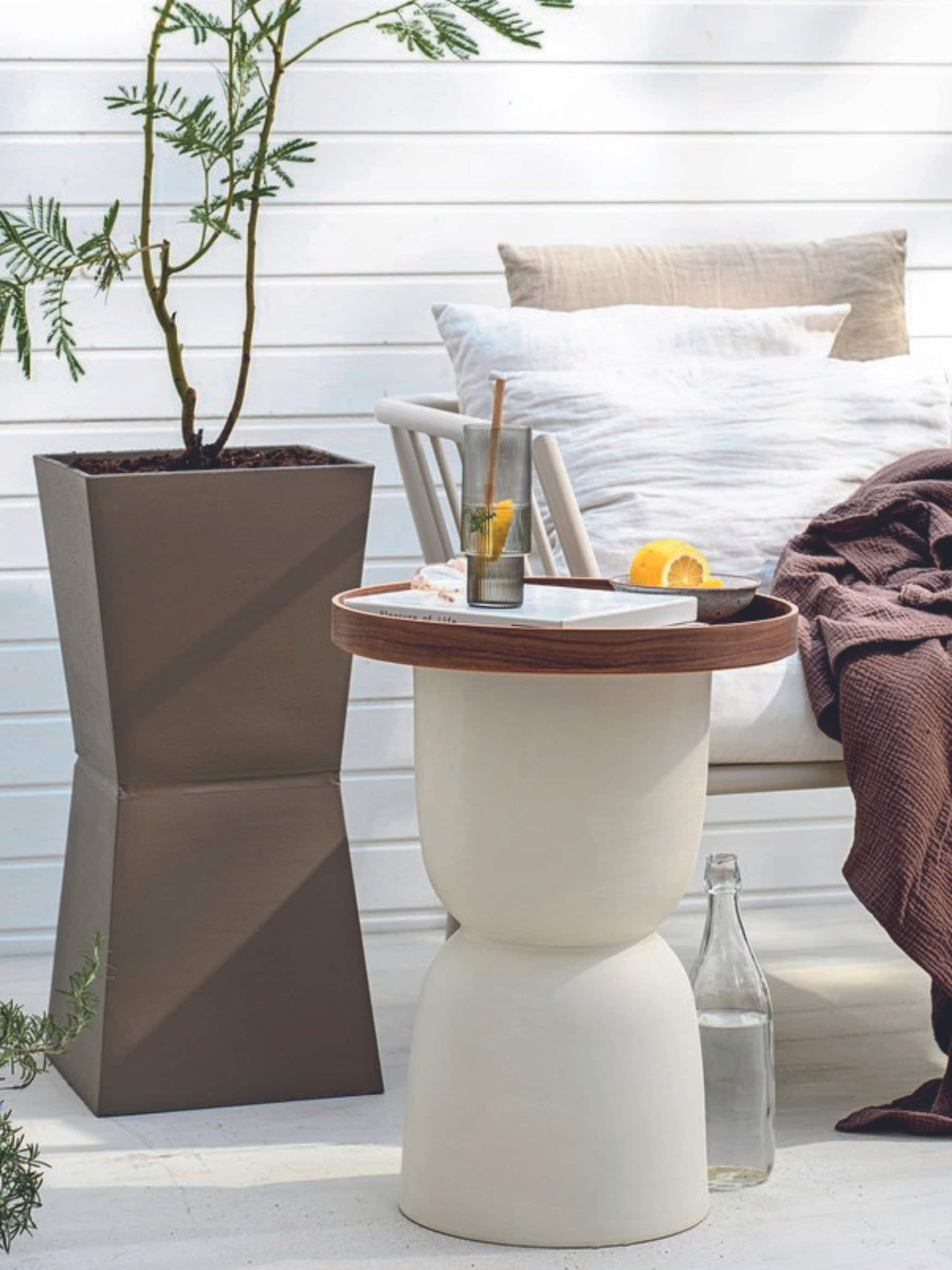 zelf bloempotten maken transformeer de tuin met deze diy diabolo bloempotten