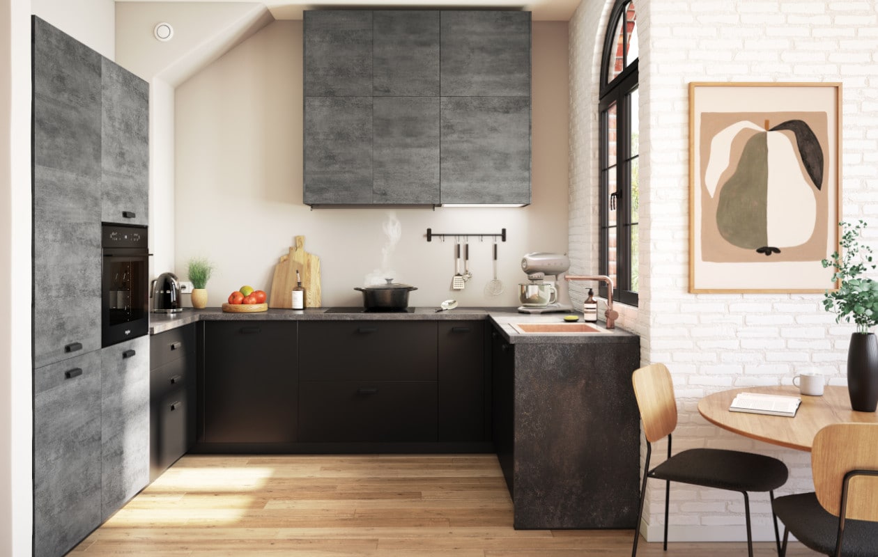De Kama Beton-keuken met zwarte fronten en fronten in betonlook.