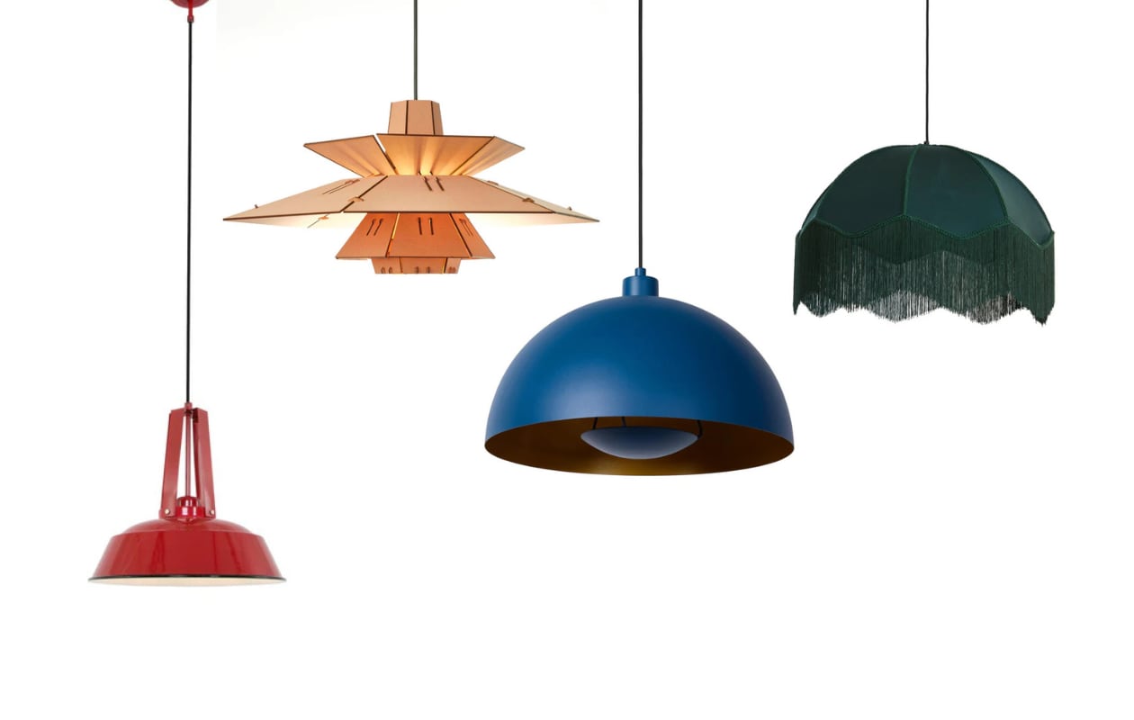 V.l.n.r.: metalen hanglamp Eden van Mexlite, 42 cm (Ø) € 69,95, mdf hanglamp PM5 van Van Tjalle en Jasper, 58x26 cm (Øxh) € 129, stalen hanglamp Siemon van Lucide, 40x20 cm (Øxh) € 95,95 en stoffen hanglamp Malacia van Light &amp; Living, 60x41 cm (Øxh) € 179 (vtwonen.nl/shop) vtwonen