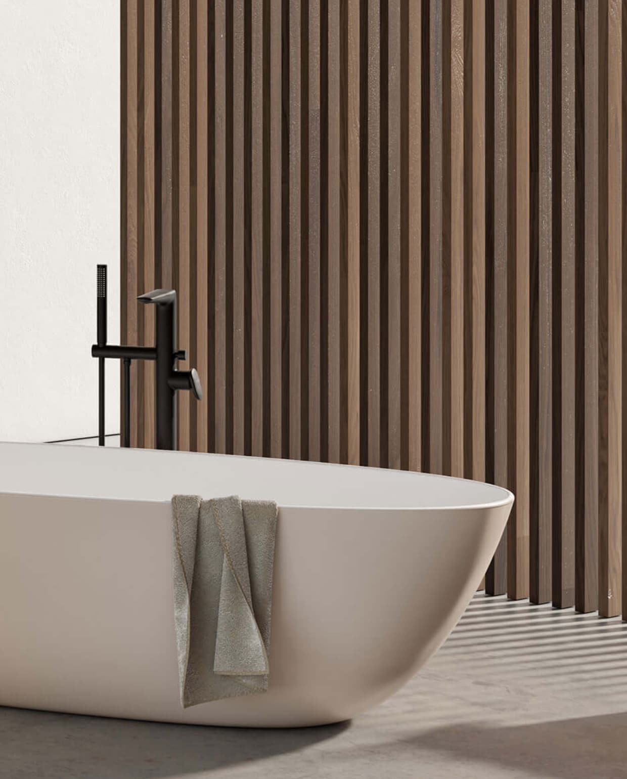 Ligbad Antao in kleur Almond staat mooi in elke badkamer. De tint zorgt voor net even meer warmte dan klassiek wit. Zeker in combinatie met Antao-badkamermeubilairin de kleur Warm Walnut. villeroy-boch.nl Stijlvol Wonen 05-2025 | dossier badkamers